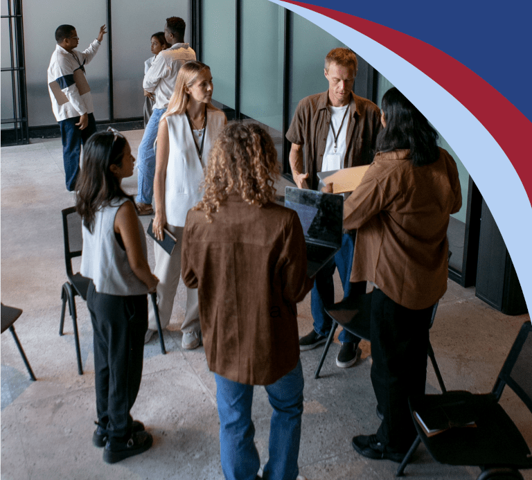 A group of employees meeting in an office